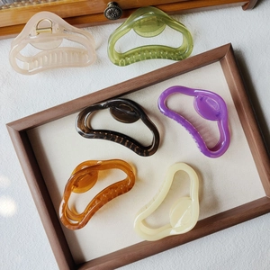 Set of 6 minimalist colorful jelly shark hair clips in various vibrant organic shapes