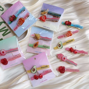 2-pack glitter fruit resin hair clips featuring cherry and strawberry on gradient card