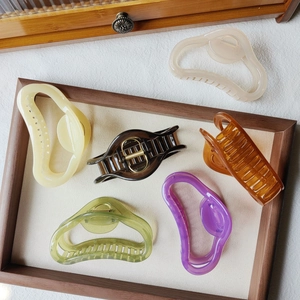 Minimalist jelly color cloud hair claws in assorted matte and glossy finishes