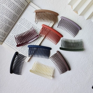Detail view of 8-piece matte finish hair side combs set in various Morandi colors
