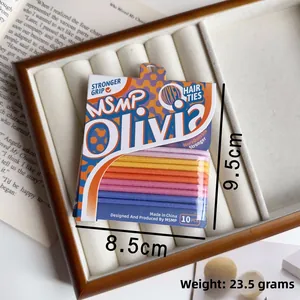 Set of 10 candy colored high elasticity hair ties in a premium display tray