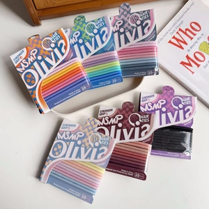 Close-up of 10-piece elastic hair ties in rainbow and pastel colors on card packaging