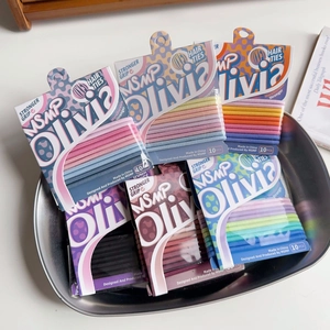 Detail of multi-color elastic hair ties pack showing high elasticity and durable weave