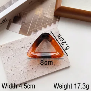 Amber tortoiseshell triangle hair claw clip in high-quality resin measuring 8cm length