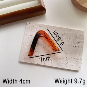 Amber tortoiseshell triangular hair claw clip for women, size 7cm base with V-shape design
