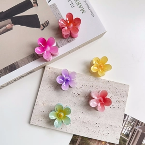 Set of six sweet floral hair claws in gradient resin colors for elegant hairstyling
