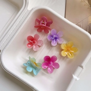 Detailed set of six colorful floral resin mini hair clips with elegant pearl centers
