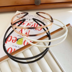 Minimalist double-layered anti-slip hair hoops in amber, white, and black resin finishes