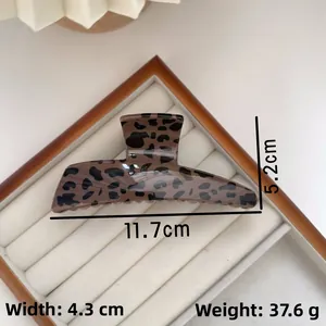 Leopard print hair claw clip detail with measurements of 11.7cm length and 4.3cm width