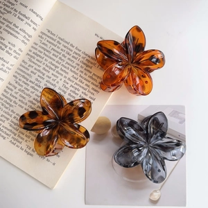 Pinze per capelli vintage a fiore in tartaruga ambra e finiture grigio traslucido