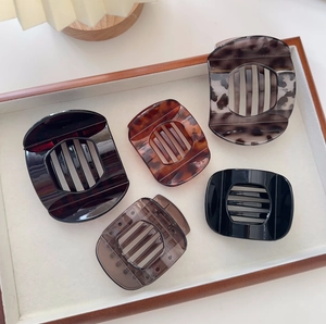 Detailed set of large vintage tortoise shell hair claws with elegant non-slip teeth design