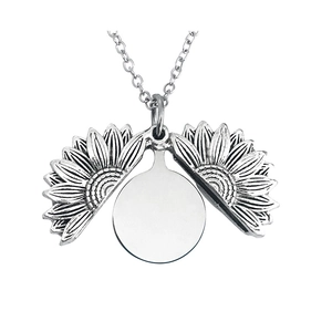 Detailed close-up of a silver sunflower locket necklace with an openable pendant design