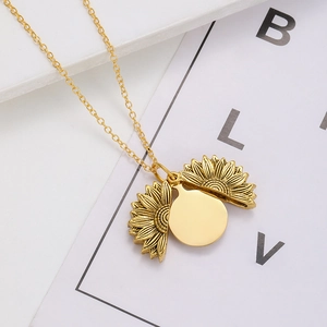 Golden stainless steel sunflower necklace featuring an openable pendant with cross chain