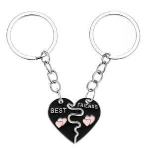 Pair of two-piece heart-shaped Best Friends enamel keychains in black alloy finish