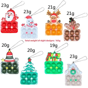 Set di 8 portachiavi natalizi Pop It in silicone con Babbo Natale e pupazzo di neve