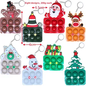 8er Set Weihnachts Silikon Pop Fidget Schlüsselanhänger mit Weihnachtsmann Motiv 9cm