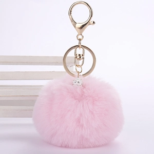 Pink faux rabbit fur pom pom keychain with sparkling crystal ball and golden hardware