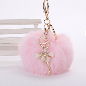 Porte-clés pompon rose en fausse fourrure avec danseuse de ballet dorée et strass