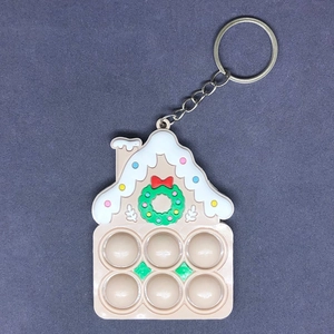 Lebkuchenhaus Silikon Fidget Spielzeug Schlüsselanhänger mit Weihnachtskranz Motiv