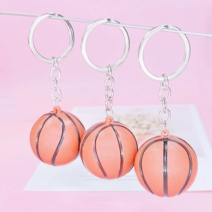 Three-piece basketball keychains with textured orange balls and silver metal chains