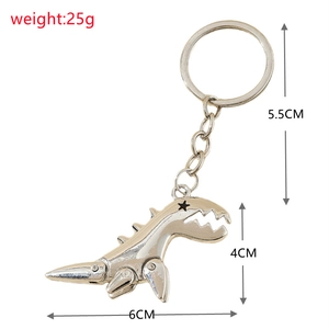 Detail view of alloy T-Rex keychain with silver finish showing dimensions and star patterns