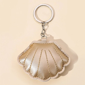 Elegant gold shell keychain made of PU leather with decorative stitching and silver ring