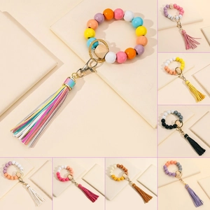 Women Wood Bead Bracelet Keychain With Faux Leather Tassel Beaded Key Ring Boho Car Key Holder Bag Pendant Fashion Accessory