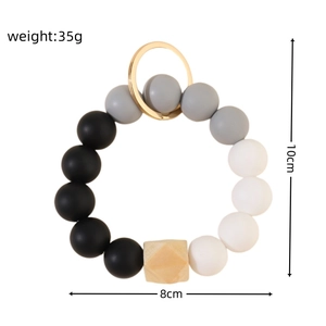 Detailed view of beaded keychain bracelet with 35g weight and dimension markers