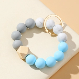 Porte-clés bracelet en perles de silicone bleu et gris avec perle en bois et anneau doré