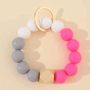 Silicone and wooden beaded keychain bracelet with golden metal ring for bags or keys