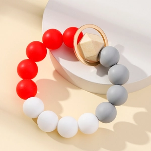 Porte-clés bracelet en perles de silicone avec perle en bois et anneau doré