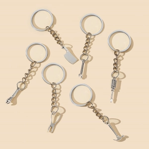 Creative 6-piece silver metal mini hardware tool keychain set featuring wrench and hammer