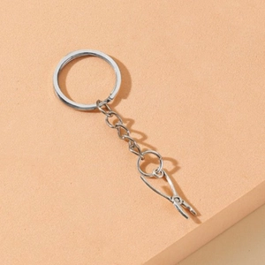 Mini silver alloy plier tool keychain pendant with a polished metal ring and chain