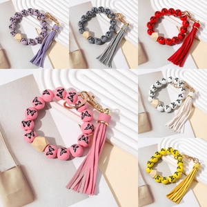 Porte-clés Bracelet Mode Perles de Bois Imprimé Papillon Avec Gland en Cuir Fermoir en Alliage Doré pour Femme Accessoire de Poignet