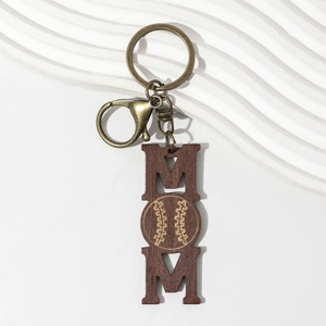 Rustic wooden baseball MOM keychain with vintage metal lobster clasp on white surface
