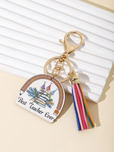 Rainbow teacher keychain with colorful tassel and Best Teacher Ever text on white pendant