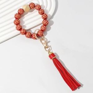 Candy-colored checkered wooden bead keychain with red PU tassel and gold hardware
