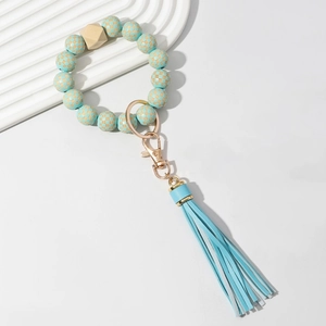 Plaid wooden bead keychain bracelet with light blue PU tassel and gold metal ring