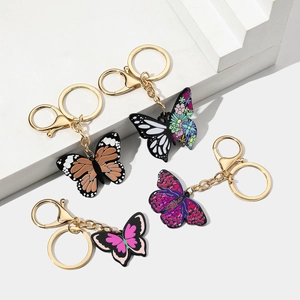 Set of four colorful acrylic butterfly keychains with gold metal rings and lobster clasps