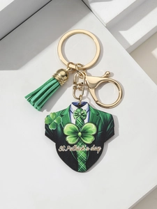 Detail of St. Patrick's Day keychain with green tassel, lobster clasp and suit charm