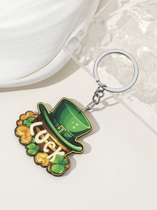 Macro view of St. Patrick's Day Luck keychain with green shamrock and gold coins