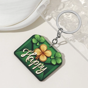 Saint Patrick's Day keychain featuring green clover shamrock designs and Happy lettering