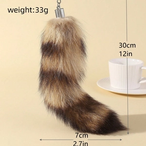 Detailed view of faux fur fox tail keychain with size 30cm and weight 33g dimensions