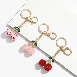 Porte-clés cerise scintillants en strass avec feuilles de cristal et fermoir doré