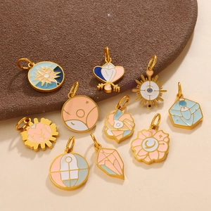 Set of 10 gold enamel celestial charms with sun heart and eye motifs for DIY jewelry