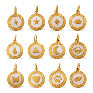 Set of 12 gold plated round charms with mother of pearl inlays and celestial motifs