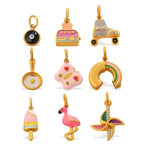 Set of nine colorful enamel jewelry pendants including rainbow ice cream and flamingos