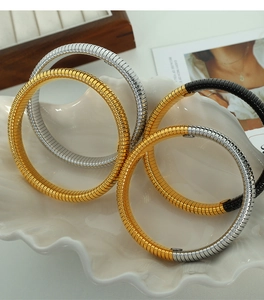 Detailed macro of 12mm vintage style flexible Tubogas snake bone stretch bracelets set
