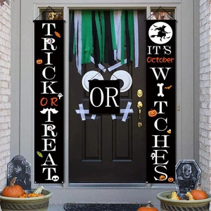 Close-up of Halloween porch banners set with Trick or Treat text and festive motifs