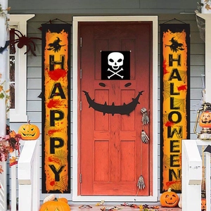 Detail of Halloween door banners featuring Happy Halloween text and festive witch illustrations